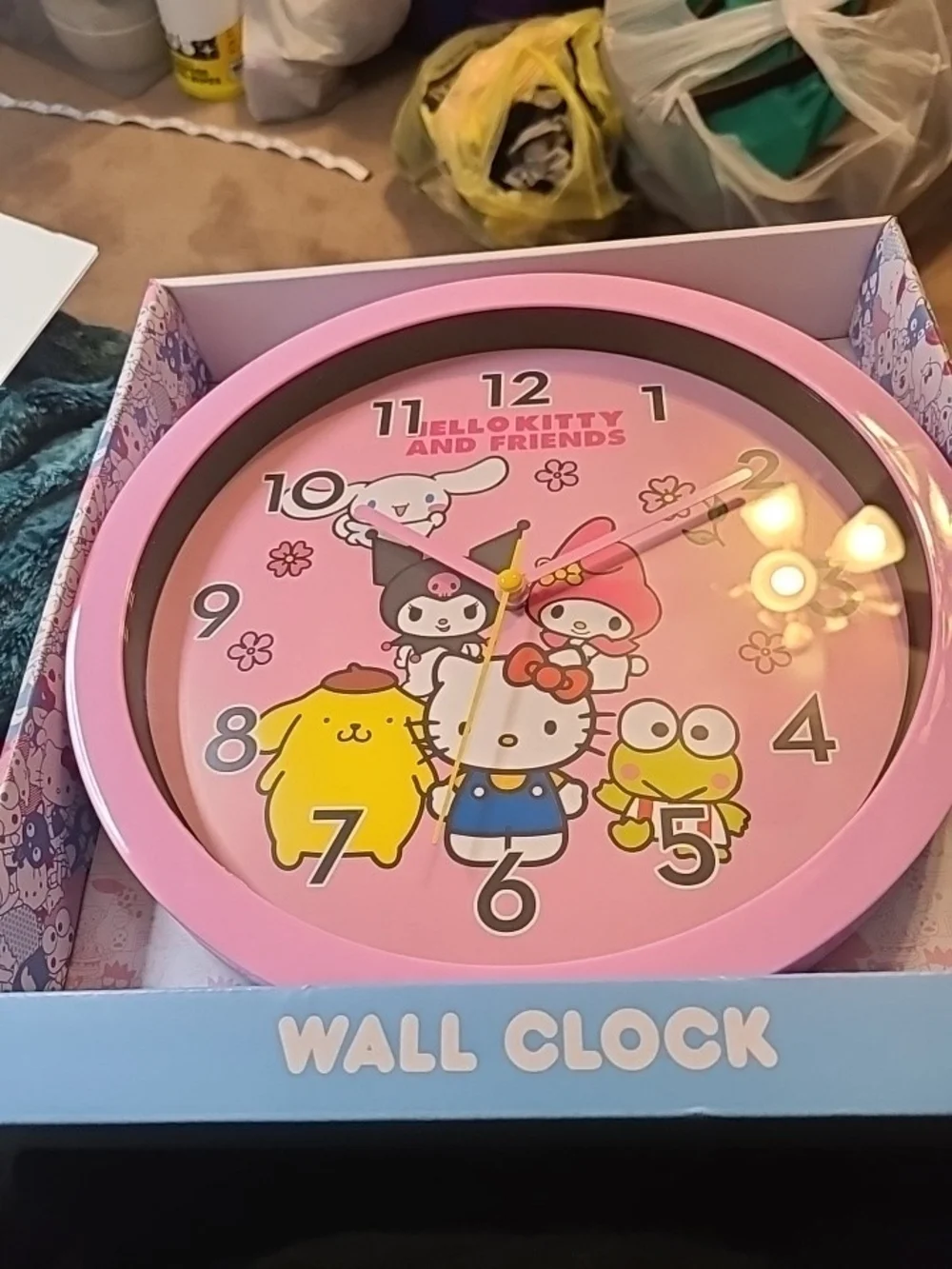 Hello Kitty Blue and Red Logo Wall Clock Packaging